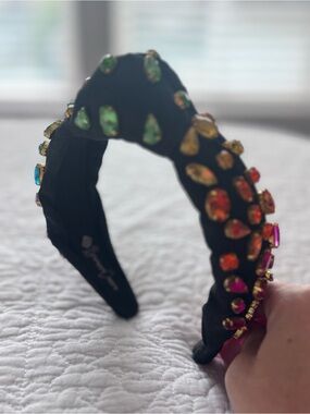 Brianna Cannon black headband with rainbow gradient hand-sewn crystals